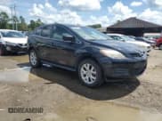 ✅ 2009 Mazda CX-7 Sport • VIN: JM3ER293390218622 • Lot: 64310045. Listed on Copart with 206,205 mi. Free auction sales archive from the USA and detailed vehicle history report at DreamBid. Image 4.