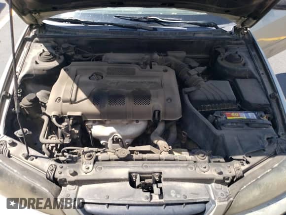 2005 Hyundai Elantra GLS z VIN KMHDN46D35U149616, wystawiony jako Copart lot #81009975 z przebiegiem 233 904 mil mil oraz Szkoda całkowita • Salvage title. Historia ofert i sprzedaży dostępna na DreamBid. Obrazek 11.