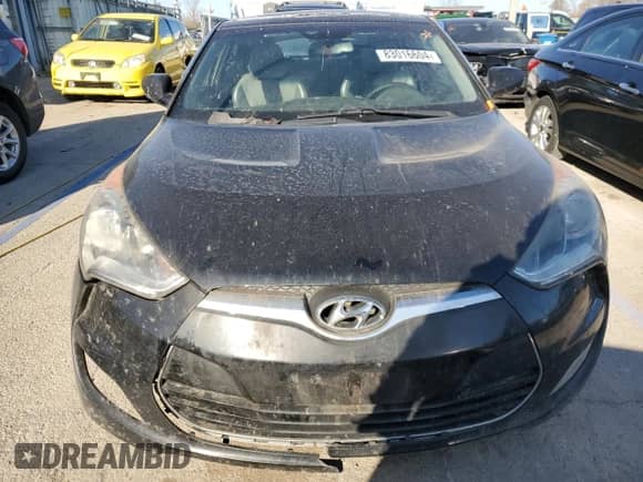 2012 Hyundai Veloster w/Red Int z VIN KMHTC6AD5CU030242, wystawiony jako Copart lot #83016604 z przebiegiem 142 555 mil mil oraz Szkoda całkowita • Salvage title. Historia ofert i sprzedaży dostępna na DreamBid. Obrazek 5.