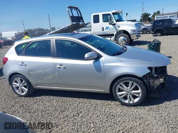 ✅ 2012 Kia Forte SX • VIN: KNAFW5A33C5600997 • Лот: 42677508. Опубликован ранее на IAAI с пробегом 102 657 миль. Бесплатный доступ к архиву аукционных продаж из США и подробный отчёт об истории автомобиля на DreamBid. Изображение 14.