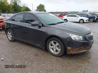 2014 Chevrolet Cruze 2LT with VIN 1G1PE5SB0E7155733, listed as a IAAI auction lot 43563910 with 145,246 mi miles and . Bid and sale history available at DreamBid. Image 1.