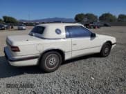 ✅ 1991 Chrysler Town & Country • VIN: ZC2FS1205MB208001 • Lot: 80365894. Listed on Copart with 61,242 mi. Free auction sales archive from the USA and detailed vehicle history report at DreamBid. Image 3.
