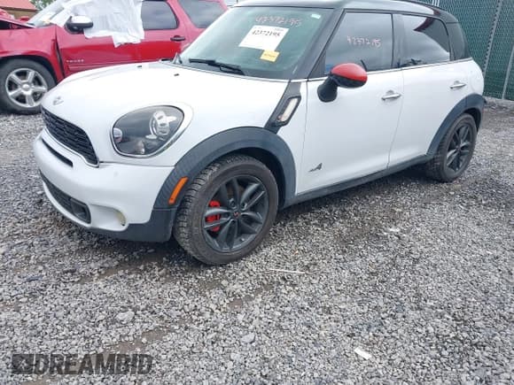✅ 2012 MINI Countryman S • VIN: WMWZC5C54CWL58610 • Lot: 42372195. Listed on IAAI with 133,556 mi. Free auction sales archive from the USA and detailed vehicle history report at DreamBid. Image 2.