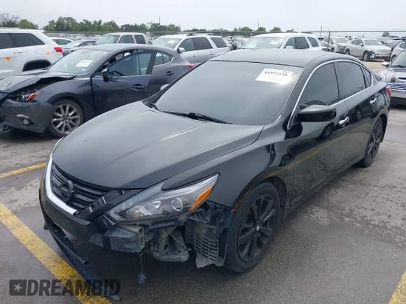 ✅ 2017 Nissan Altima SV • VIN: 1N4AL3AP4HC215163 • Lot: 41972238. Listed on IAAI with 147,627 mi. Free auction sales archive from the USA and detailed vehicle history report at DreamBid. Image 17.