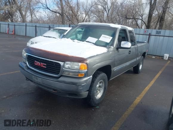 ✅ 1999 GMC Sierra 1500 SLE • VIN: 2GTEK19T0X1571103 • Лот: 41803379. Опубликован ранее на IAAI с пробегом 232 933 миль. Бесплатный доступ к архиву аукционных продаж из США и подробный отчёт об истории автомобиля на DreamBid. Изображение 2.