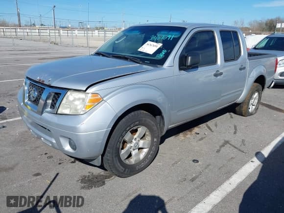 ✅ 2010 Nissan Frontier SE • VIN: 1N6AD0ERXAC422306 • Лот: 40004436. Опубликован ранее на IAAI с пробегом 198 732 миль. Бесплатный доступ к архиву аукционных продаж из США и подробный отчёт об истории автомобиля на DreamBid. Изображение 2.