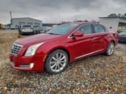✅ 2013 Cadillac XTS Luxury • VIN: 2G61P5S35D9141293 • Лот: 93905275. Опубликован ранее на Copart с пробегом 137 641 миль. Бесплатный доступ к архиву аукционных продаж из США и подробный отчёт об истории автомобиля на DreamBid. Изображение 1.