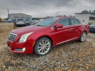 ✅ 2013 Cadillac XTS Luxury • VIN: 2G61P5S35D9141293 • Лот: 93905275. Опубликован ранее на Copart с пробегом 137 641 миль. Бесплатный доступ к архиву аукционных продаж из США и подробный отчёт об истории автомобиля на DreamBid. Изображение 1.