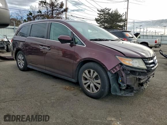 ✅ 2014 Honda Odyssey EX-L • VIN: 5FNRL5H64EB077967 • Lot: 94252755. Listed on Copart with 175,051 mi. Free auction sales archive from the USA and detailed vehicle history report at DreamBid. Image 4.