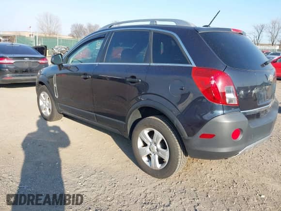 2015 Chevrolet Captiva Sport LS z VIN 3GNAL2EK5FS504411, wystawiony jako IAAI lot #41718728 z przebiegiem 72 474 mil mil oraz . Historia ofert i sprzedaży dostępna na DreamBid. Obrazek 3.