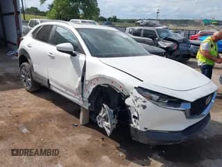 ✅ 2024 Mazda CX-30 S Carbon Edition • VIN: 3MVDMBCM8RM683204 • Lot: 42877652. Listed on IAAI with 7,411 mi. Free auction sales archive from the USA and detailed vehicle history report at DreamBid. Image 1.