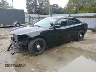 2020 Dodge Charger Police with VIN 2C3CDXKT2LH127547, listed as a Copart auction lot 85759405 with 71,896 mi miles and Salvage title. Bid and sale history available at DreamBid. Image 1.