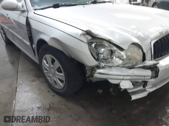 2002 Hyundai Sonata z VIN KMHWF25S42A574561, wystawiony jako IAAI lot #41613838 z przebiegiem 141 808 mil mil oraz . Historia ofert i sprzedaży dostępna na DreamBid. Obrazek 6.