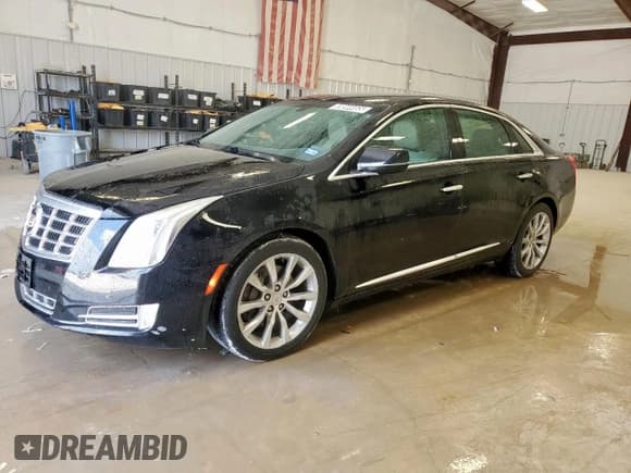 ✅ 2015 Cadillac XTS Luxury • VIN: 2G61N5S38F9254714 • Lot: 69844465. Wystawiony na Copart z przebiegiem 131 303 mil. Bezpłatny archiwum sprzedaży aukcyjnych z USA i szczegółowy raport historii pojazdu na DreamBid. Zdjęcie 1.