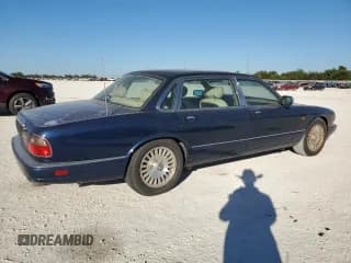 ✅ 1997 Jaguar XJ Vanden Plas • VIN: SAJKX6244VC801688 • Лот: 80841864. Опубликован ранее на Copart с пробегом Не указан. Бесплатный доступ к архиву аукционных продаж из США и подробный отчёт об истории автомобиля на DreamBid. Изображение 3.