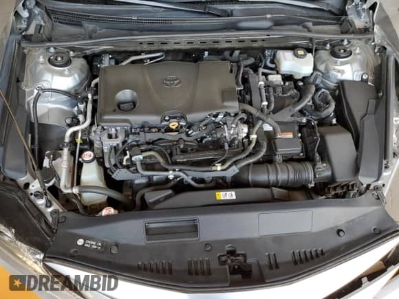 2021 Toyota Camry Hybrid LE with VIN 4T1C31AK5MU554381, listed as a Copart auction lot 69998775 with 104,313 mi miles and Salvage title. Bid and sale history available at DreamBid. Image 11.