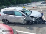 ✅ 2017 Nissan Rogue SL • VIN: JN8AT2MT1HW403414 • Lot: 42752423. Listed on IAAI with 113,683 mi. Free auction sales archive from the USA and detailed vehicle history report at DreamBid. Image 14.