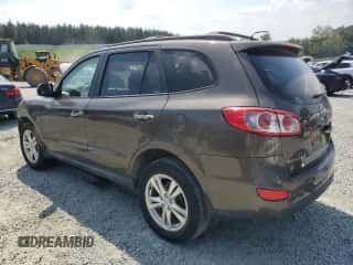 2012 Hyundai Santa Fe Limited с VIN 5XYZK4AG5CG154058, выставлен на аукционе Copart как лот 67898394 с пробегом 94 880 миль миль и Списание • Salvage title. История ставок и продаж доступна на DreamBid. Изображение 2.
