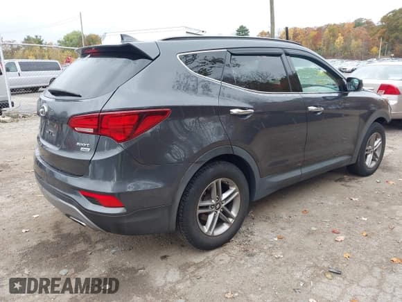 ✅ 2017 Hyundai Santa Fe 2.4L • VIN: 5XYZUDLB8HG383854 • Lot: 43503557. Listed on IAAI with 97,144 mi. Free auction sales archive from the USA and detailed vehicle history report at DreamBid. Image 4.