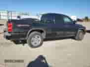 2006 Dodge Dakota SLT with VIN 1D7HE42N26S542062, listed as a Copart auction lot 84168115 with 194,411 mi miles and Salvage title. Bid and sale history available at DreamBid. Image 3.