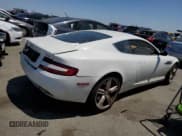 ✅ 2009 Aston Martin DB9 • VIN: SCFAD01E59GA10941 • Lot: 57220313. Wystawiony na Copart z przebiegiem 24 818 mil. Bezpłatny archiwum sprzedaży aukcyjnych z USA i szczegółowy raport historii pojazdu na DreamBid. Zdjęcie 3.