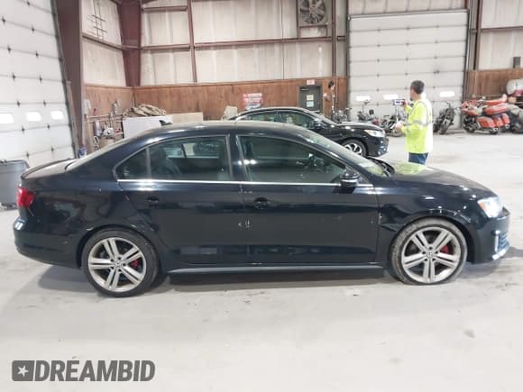 ✅ 2015 Volkswagen Jetta GLI SEL • VIN: 3VW5T7AJ0FM275867 • Lot: 42133491. Listed on IAAI with 98,718 mi. Free auction sales archive from the USA and detailed vehicle history report at DreamBid. Image 14.