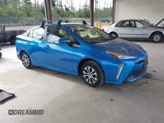 ✅ 2020 Toyota Prius LE • VIN: JTDL9RFU5L3018787 • Lot: 42723431. Listed on IAAI with 30,793 mi. Free auction sales archive from the USA and detailed vehicle history report at DreamBid. Image 1.
