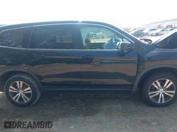 ✅ 2017 Honda Pilot EX-L • VIN: 5FNYF6H57HB032784 • Lot: 42893011. Listed on IAAI with 125,407 mi. Free auction sales archive from the USA and detailed vehicle history report at DreamBid. Image 13.