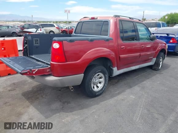 ✅ 2001 Ford Explorer Sport Trac • VIN: 1FMZU67E21UA92783 • Lot: 42847776. Listed on IAAI with 114,901 mi. Free auction sales archive from the USA and detailed vehicle history report at DreamBid. Image 4.