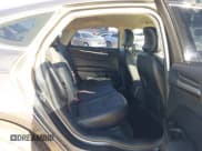 ✅ 2017 Ford Fusion Titanium • VIN: 3FA6P0SU0HR379525 • Lot: 43834410. Wystawiony na IAAI z przebiegiem 87 637 mil. Bezpłatny archiwum sprzedaży aukcyjnych z USA i szczegółowy raport historii pojazdu na DreamBid. Zdjęcie 8.