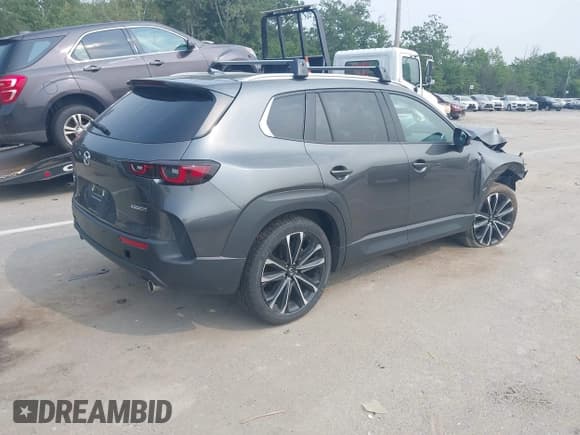 ✅ 2023 Mazda CX-50 S Premium Plus • VIN: 7MMVABEM1PN136600 • Lot: 42873101. Wystawiony na IAAI z przebiegiem 21 044 mil. Bezpłatny archiwum sprzedaży aukcyjnych z USA i szczegółowy raport historii pojazdu na DreamBid. Zdjęcie 4.