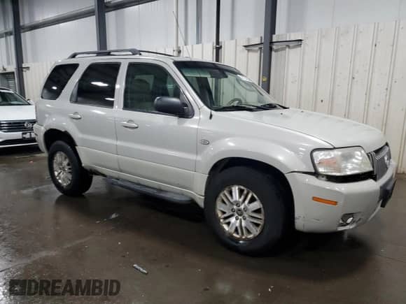 2007 Mercury Mariner Premier с VIN 4M2CU97127KJ20010, выставлен на аукционе Copart как лот 52123205 с пробегом 162 337 миль миль и Списание • Salvage title. История ставок и продаж доступна на DreamBid. Изображение 4.