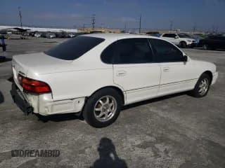 ✅ 1999 Toyota Avalon XL • VIN: 4T1BF18B9XU323397 • Лот: 77034064. Опубликован ранее на Copart с пробегом 236 026 миль. Бесплатный доступ к архиву аукционных продаж из США и подробный отчёт об истории автомобиля на DreamBid. Изображение 3.
