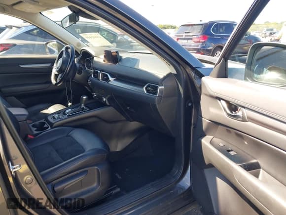 ✅ 2018 Mazda CX-5 Touring • VIN: JM3KFACM5J1349573 • Lot: 43341449. Listed on IAAI with 45,527 mi. Free auction sales archive from the USA and detailed vehicle history report at DreamBid. Image 5.