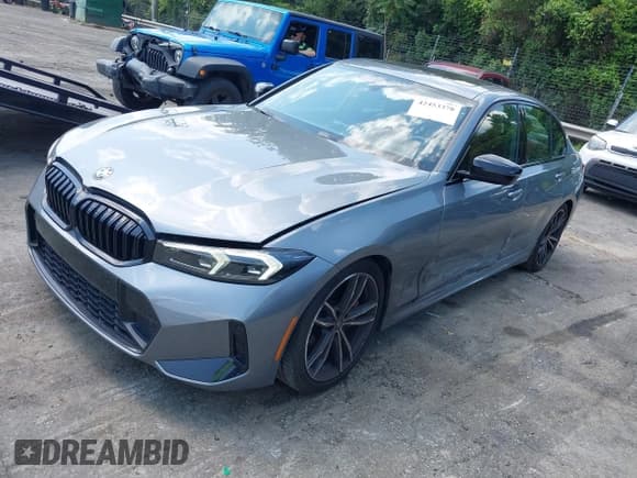 ✅ 2023 BMW 3 Series 330i • VIN: 3MW69FF07P8C98327 • Lot: 42453378. Listed on IAAI with 35,367 mi. Free auction sales archive from the USA and detailed vehicle history report at DreamBid. Image 2.