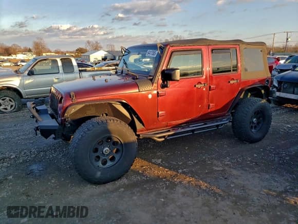 ✅ 2007 Jeep Wrangler Unlimited X • VIN: 1J4GA39157L168163 • Lot: 94417505. Listed on Copart with 155,026 mi. Free auction sales archive from the USA and detailed vehicle history report at DreamBid. Image 1.