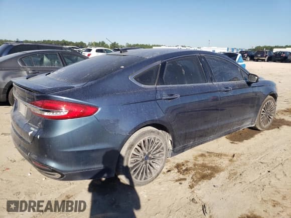 ✅ 2018 Ford Fusion Titanium • VIN: 3FA6P0D96JR234004 • Lot: 86815465. Wystawiony na Copart z przebiegiem 205 379 mil. Bezpłatny archiwum sprzedaży aukcyjnych z USA i szczegółowy raport historii pojazdu na DreamBid. Zdjęcie 3.