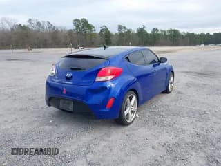 ✅ 2013 Hyundai Veloster w/Black Int • VIN: KMHTC6ADXDU094407 • Lot: 41605155. Wystawiony na IAAI z przebiegiem 137 080 mil. Bezpłatny archiwum sprzedaży aukcyjnych z USA i szczegółowy raport historii pojazdu na DreamBid. Zdjęcie 4.