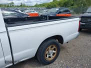 ✅ 2000 Nissan Frontier XE • VIN: 1N6DD21S1YC396142 • Lot: 43082986. Listed on IAAI with 131,181 mi. Free auction sales archive from the USA and detailed vehicle history report at DreamBid. Image 6.