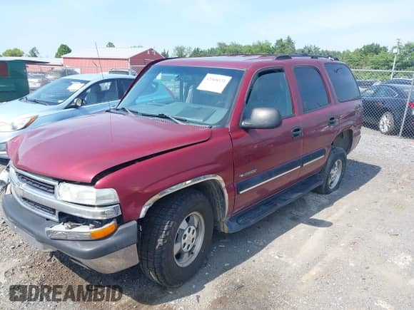 2001 Chevrolet Tahoe LT z VIN 1GNEK13T21J295102, wystawiony jako IAAI lot #42568135 z przebiegiem 286 769 mil mil oraz . Historia ofert i sprzedaży dostępna na DreamBid. Obrazek 2.