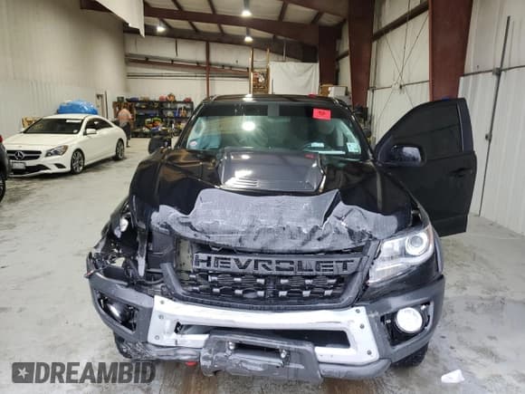 ✅ 2022 Chevrolet Colorado 4WD ZR2 • VIN: 1GCGTEEN6N1194221 • Лот: 70343434. Опубликован ранее на Copart с пробегом 17 367 миль. Бесплатный доступ к архиву аукционных продаж из США и подробный отчёт об истории автомобиля на DreamBid. Изображение 12.