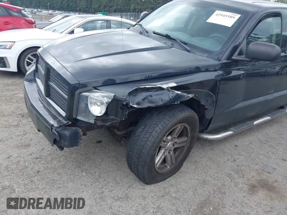 ✅ 2007 Dodge Dakota SLT • VIN: 1D7HW48P37S144432 • Лот: 42945589. Опубликован ранее на IAAI с пробегом 143 643 миль. Бесплатный доступ к архиву аукционных продаж из США и подробный отчёт об истории автомобиля на DreamBid. Изображение 6.