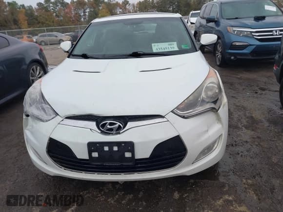 ✅ 2013 Hyundai Veloster w/Black Int • VIN: KMHTC6AD9DU145590 • Lot: 43545139. Wystawiony na IAAI z przebiegiem 155 729 mil. Bezpłatny archiwum sprzedaży aukcyjnych z USA i szczegółowy raport historii pojazdu na DreamBid. Zdjęcie 12.