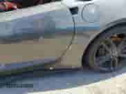 2015 Chevrolet Corvette Z51 3LT с VIN 1G1YM2D79F5107403, выставлен на аукционе Copart как лот 76190254 с пробегом Не указан миль и Списание • Salvage title. История ставок и продаж доступна на DreamBid. Изображение 12.