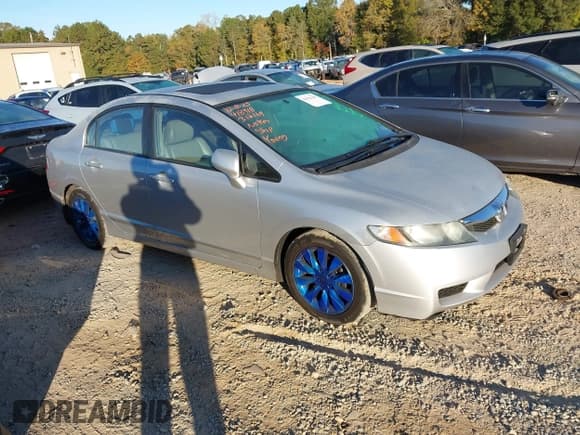 ✅ 2010 Honda Civic EX-L • VIN: 2HGFA1F97AH312169 • Lot: 43521305. Listed on IAAI with 219,389 mi. Free auction sales archive from the USA and detailed vehicle history report at DreamBid. Image 1.