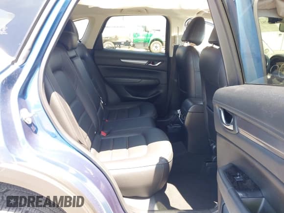 ✅ 2022 Mazda CX-5 S Carbon Edition • VIN: JM3KFBCM4N0584354 • Lot: 42817467. Listed on IAAI with 57,528 mi. Free auction sales archive from the USA and detailed vehicle history report at DreamBid. Image 8.