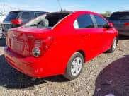 ✅ 2016 Chevrolet Sonic LS • VIN: 1G1JA5SH9G4182018 • Lot: 43610931. Listed on IAAI with 36,832 mi. Free auction sales archive from the USA and detailed vehicle history report at DreamBid. Image 4.