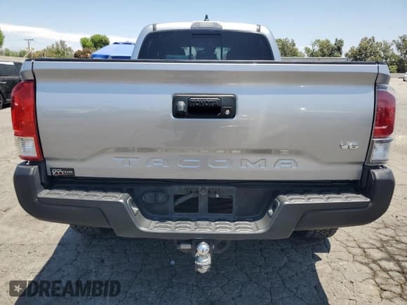 ✅ 2021 Toyota Tacoma SR5 • VIN: 3TYBZ5DN0MT000461 • Lot: 63437695. Listed on Copart with 80,017 mi. Free auction sales archive from the USA and detailed vehicle history report at DreamBid. Image 6.