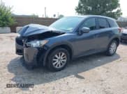 ✅ 2013 Mazda CX-5 Touring • VIN: JM3KE2CE7D0120985 • Lot: 42882325. Wystawiony na IAAI z przebiegiem 128 360 mil. Bezpłatny archiwum sprzedaży aukcyjnych z USA i szczegółowy raport historii pojazdu na DreamBid. Zdjęcie 2.