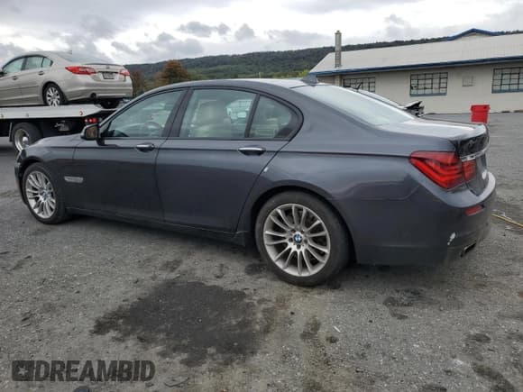 ✅ 2014 BMW 7 Series 750i xDrive • VIN: WBAYB6C58ED224525 • Lot: 86831595. Wystawiony na Copart z przebiegiem 143 385 mil. Bezpłatny archiwum sprzedaży aukcyjnych z USA i szczegółowy raport historii pojazdu na DreamBid. Zdjęcie 2.
